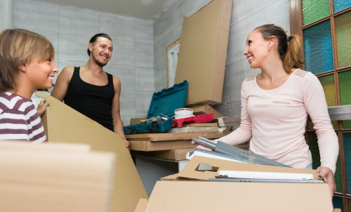 Removal team planning a home move in Kennington on a residential street