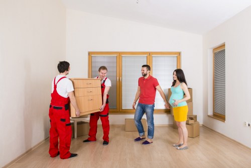 Careful loading of boxes and furniture for a small move in Kennington