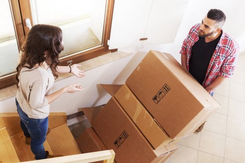 Professional movers handling furniture during a local Kennington move